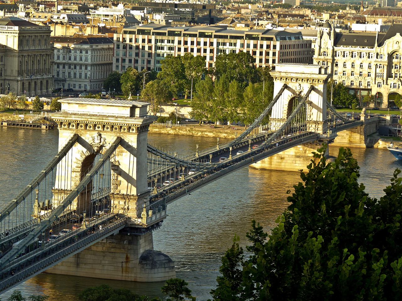 The Szechenyi Chain Bridge spanning the Danube under bright summer sunlight