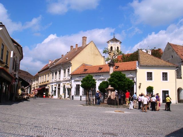The Main Square of Szentendre's old town, lined with pastel historic buildings