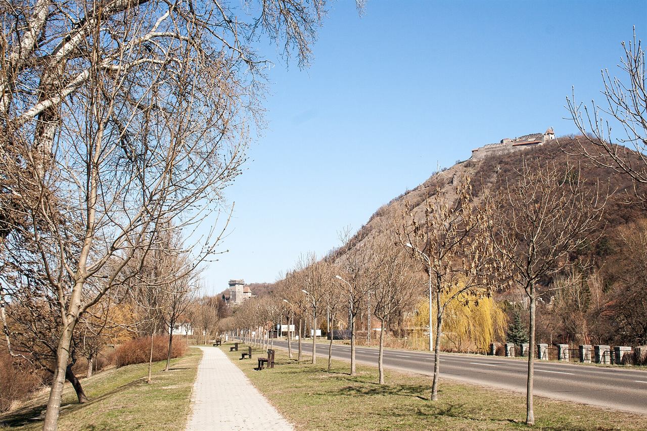 View of the hilltop Visegrad Citadel walls seen from the bank of the Danube